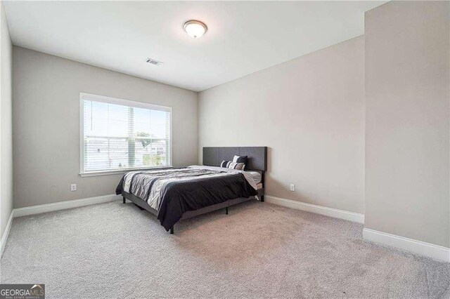 6375 Haystack Ct, Cumming, GA 30040 - carpeted bedroom with baseboards and visible vents