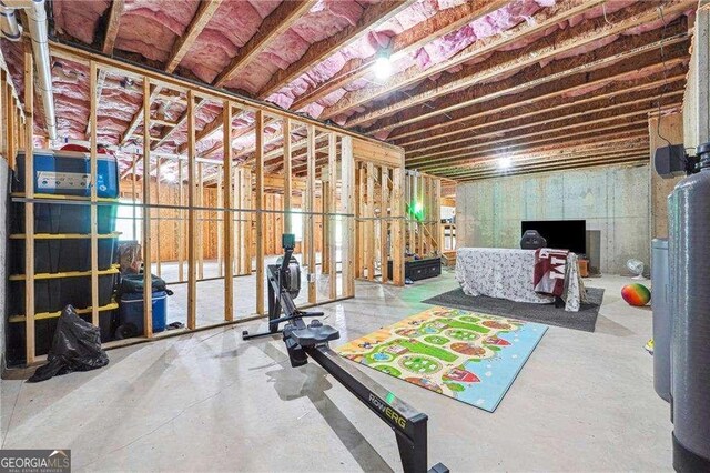 6375 Haystack Ct, Cumming, GA 30040 - garage with concrete driveway and freestanding refrigerator