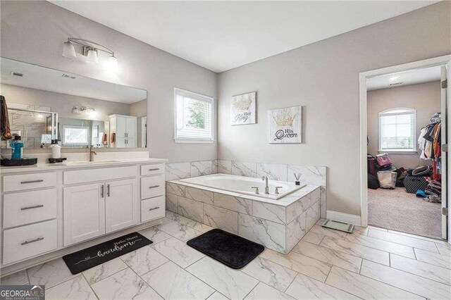 6375 Haystack Ct, Cumming, GA 30040 - full bathroom with marble finish floors, a bath, and vanity