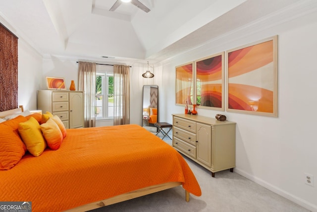 bedroom featuring a ceiling fan, light carpet, baseboards, and vaulted ceiling