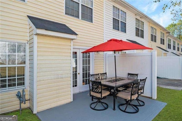 6918 Gallant Cir SE Unit 22, Mableton, GA 30126 - view of patio / terrace with outdoor dining space, french doors, and fence