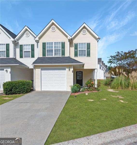 6918 Gallant Cir SE Unit 22, Mableton, GA 30126 - multi unit property with a garage, driveway, and a front yard