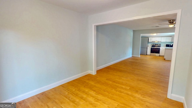 165 Cherokee Cir, Hinesville, GA 31313 - corridor with light wood finished floors and baseboards