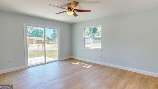 165 Cherokee Cir, Hinesville, GA 31313 - spare room featuring plenty of natural light, baseboards, and ceiling fan