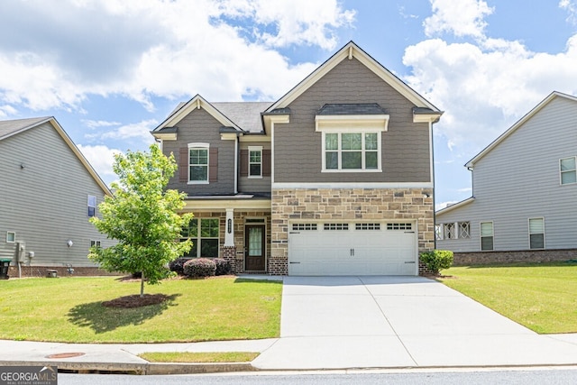 craftsman-style home featuring driveway, a front lawn, a garage, and stone siding