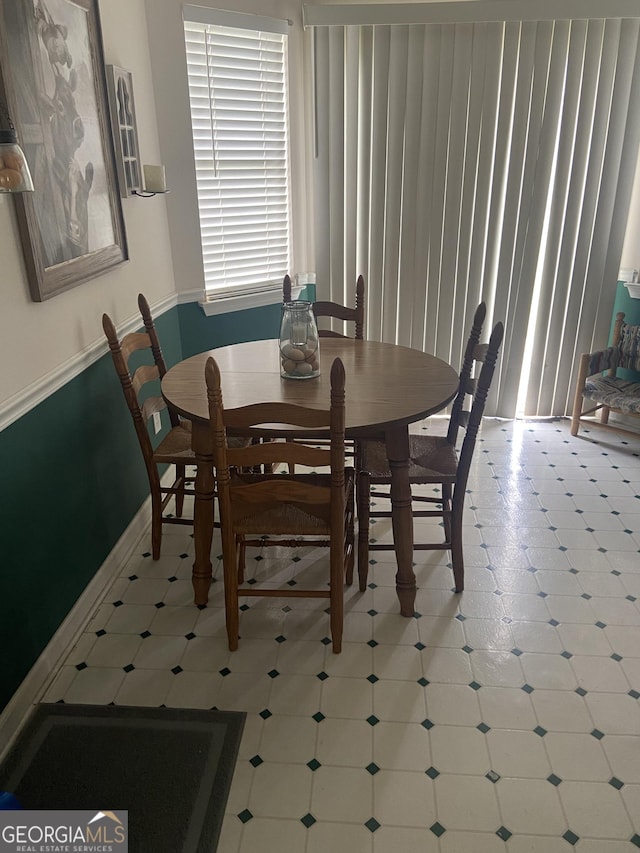 248 Fern Ct, Hampton, GA 30228 - dining area with baseboards and tile patterned floors