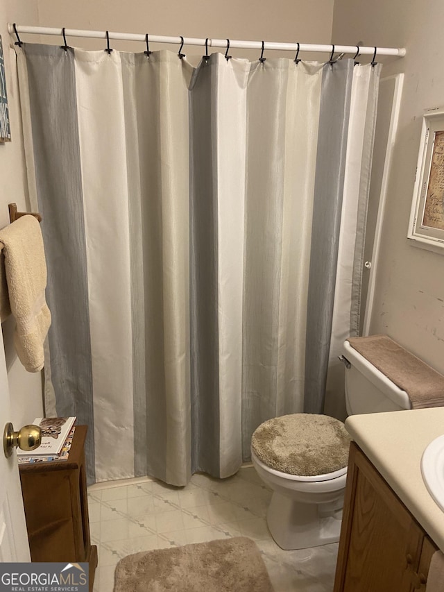 248 Fern Ct, Hampton, GA 30228 - bathroom with vanity and toilet