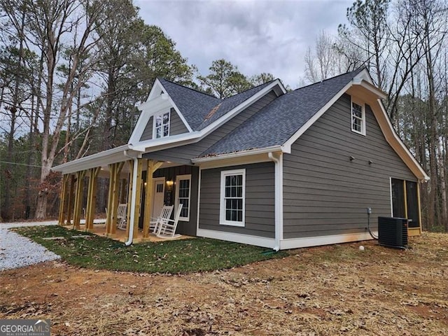 40 Luther Knight Rd, Cartersville, GA 30121 - view of property exterior featuring central air condition unit and roof with shingles