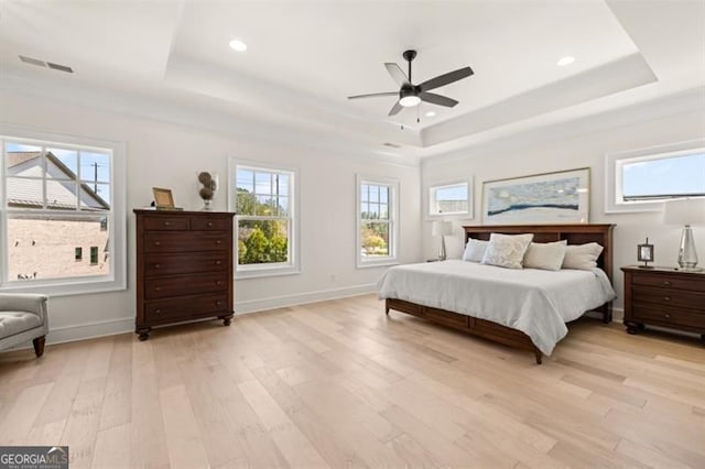 5247 Flannery Chase SW, Powder Springs, GA 30127 - bedroom featuring a tray ceiling, multiple windows, light wood finished floors, baseboards, and recessed lighting