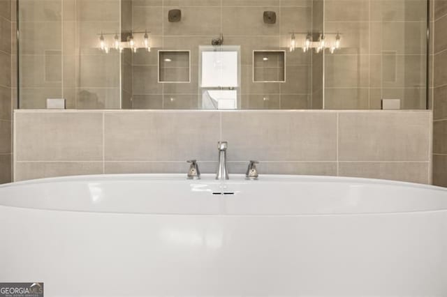 5247 Flannery Chase SW, Powder Springs, GA 30127 - bathroom featuring a freestanding tub