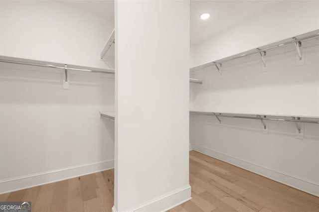 5247 Flannery Chase SW, Powder Springs, GA 30127 - spacious closet featuring light wood-style flooring