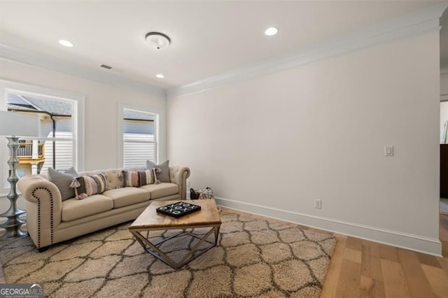 5247 Flannery Chase SW, Powder Springs, GA 30127 - living room with wood finished floors, baseboards, recessed lighting, and ornamental molding