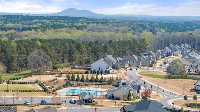 5247 Flannery Chase SW, Powder Springs, GA 30127 - drone / aerial view of a heavily wooded area and a pool