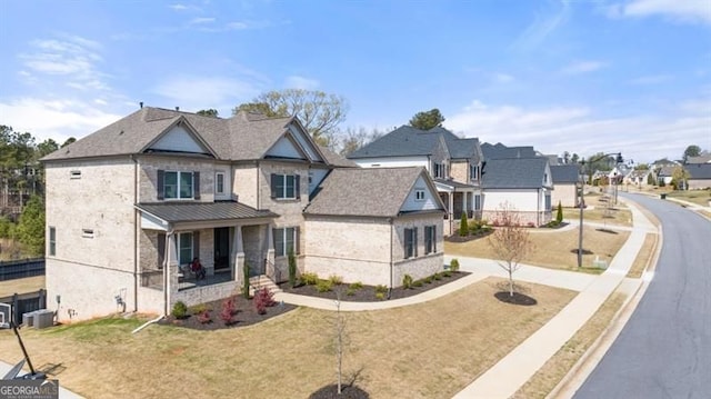 5247 Flannery Chase SW, Powder Springs, GA 30127 - view of front facade with covered porch, a residential view, a front yard, and brick siding