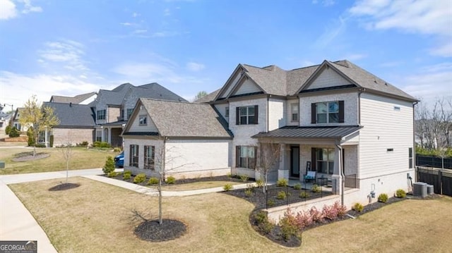 5247 Flannery Chase SW, Powder Springs, GA 30127 - view of front of home featuring a porch, a front yard, a standing seam roof, and cooling unit