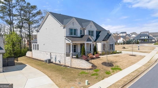 5247 Flannery Chase SW, Powder Springs, GA 30127 - view of front facade with a residential view, stone siding, and cooling unit