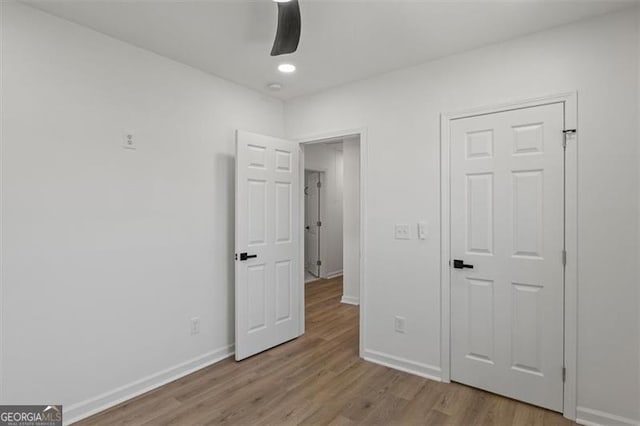 3634 Oakleaf Pass, Fairburn, GA 30213 - unfurnished bedroom with a ceiling fan, wood finished floors, baseboards, and recessed lighting