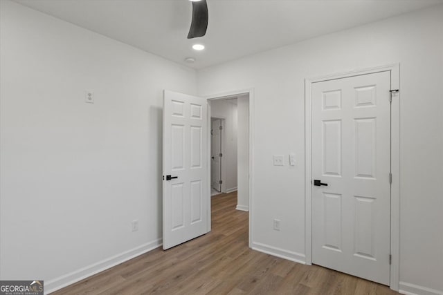 3634 Oakleaf Pass, Fairburn, GA 30213 - unfurnished bedroom with ceiling fan, recessed lighting, baseboards, and wood finished floors