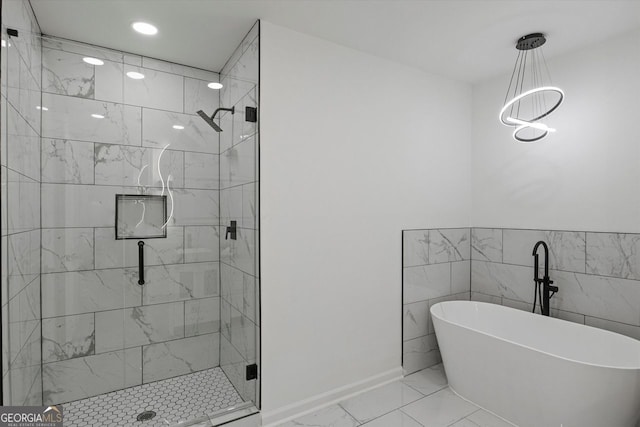 3634 Oakleaf Pass, Fairburn, GA 30213 - bathroom featuring a freestanding bath, baseboards, a shower stall, marble finish floor, and recessed lighting