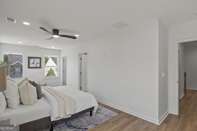 3634 Oakleaf Pass, Fairburn, GA 30213 - bedroom with visible vents, wood finished floors, and baseboards