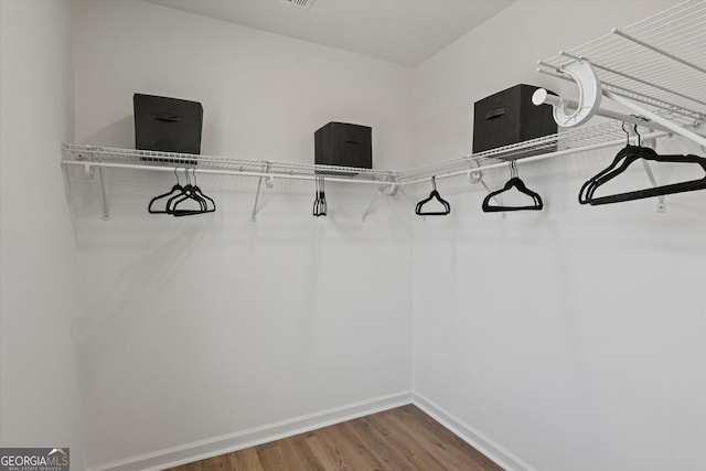 3634 Oakleaf Pass, Fairburn, GA 30213 - spacious closet featuring wood finished floors