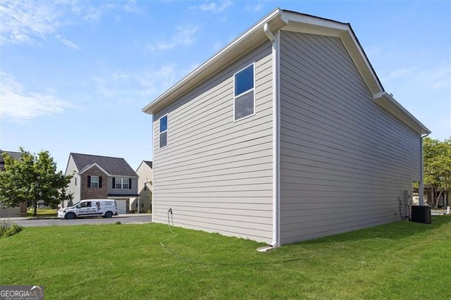 3634 Oakleaf Pass, Fairburn, GA 30213 - view of side of property featuring a yard and central air condition unit