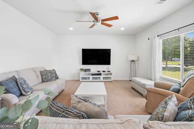 living room with carpet floors, ceiling fan, recessed lighting, and baseboards
