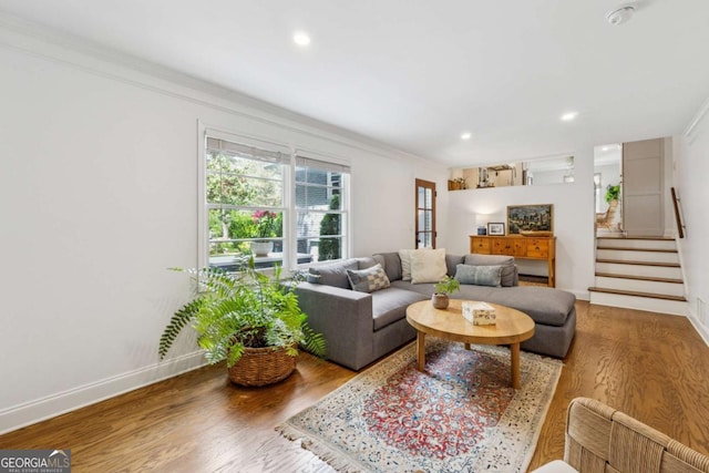 3772 Evans Rd, Atlanta, GA 30340 - living room with crown molding, wood finished floors, stairs, baseboards, and recessed lighting