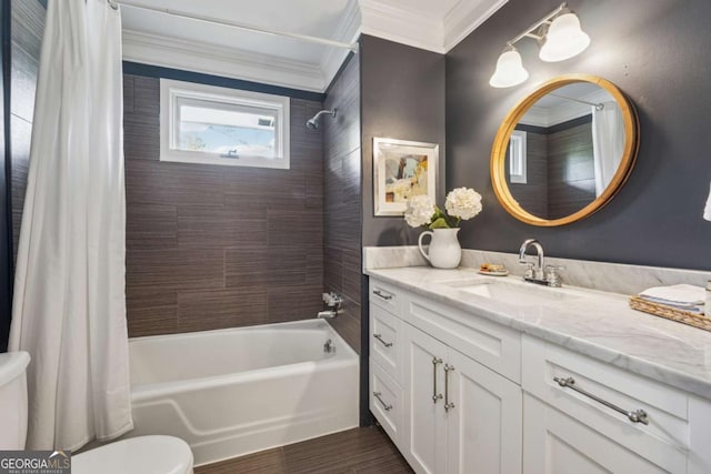 bathroom with crown molding, toilet, shower / tub combo, and vanity
