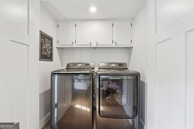 washroom with separate washer and dryer, cabinet space, recessed lighting, and baseboards