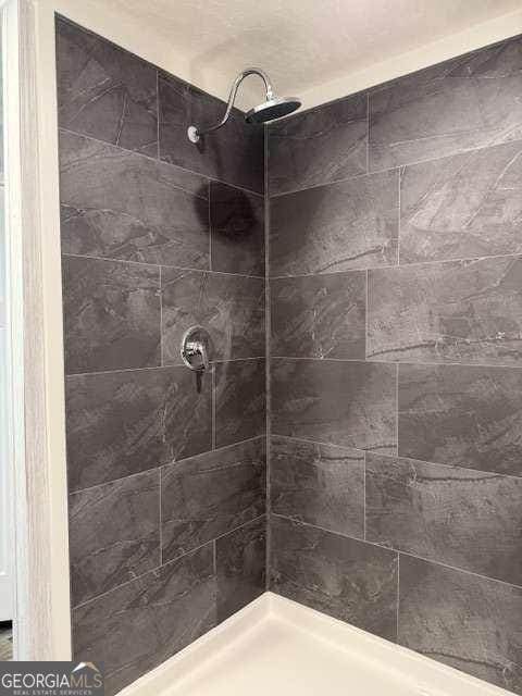 236 Dewaters Rd, Commerce, GA 30529 - bathroom featuring tiled shower