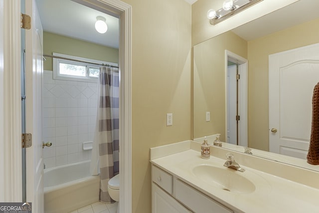 bathroom featuring tile patterned floors, toilet, shower / tub combo, and vanity