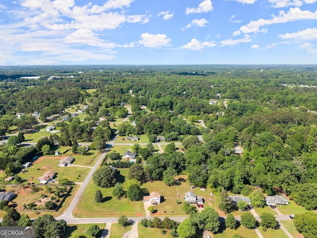 bird's eye view with a view of trees