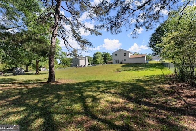 view of yard with fence