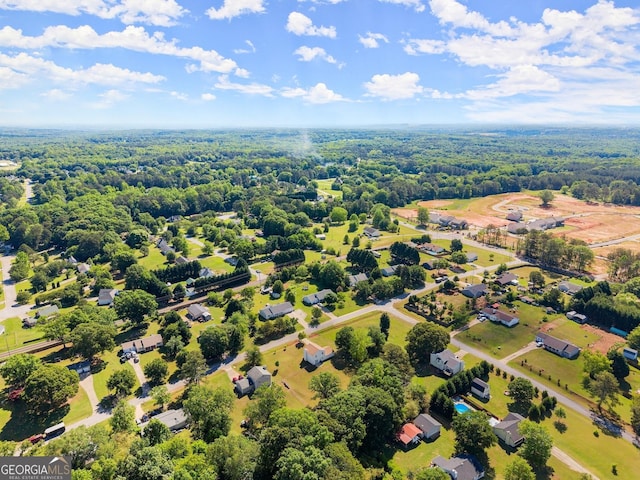 aerial view with a wooded view