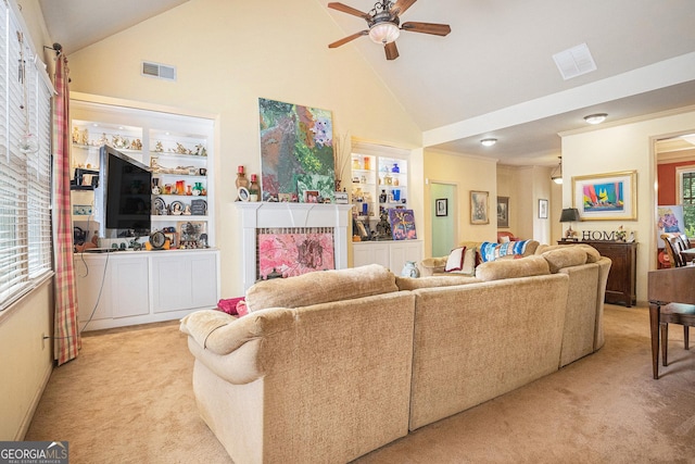 137 New Cut Rd, Winder, GA 30680 - living area with light colored carpet, high vaulted ceiling, and a ceiling fan