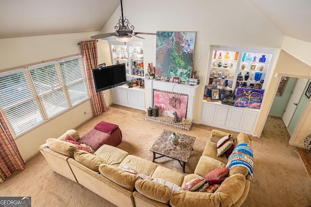 137 New Cut Rd, Winder, GA 30680 - living area with lofted ceiling, carpet, and a ceiling fan