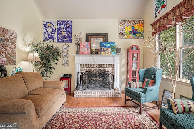 137 New Cut Rd, Winder, GA 30680 - living area featuring wood finished floors and a brick fireplace