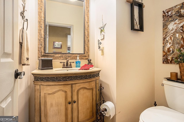137 New Cut Rd, Winder, GA 30680 - bathroom featuring toilet and vanity