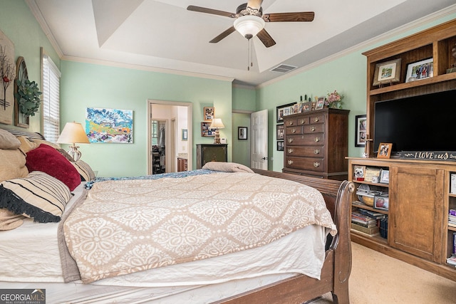 137 New Cut Rd, Winder, GA 30680 - bedroom with a tray ceiling, carpet floors, ornamental molding, ceiling fan, and ensuite bathroom
