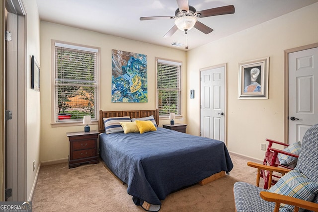 137 New Cut Rd, Winder, GA 30680 - carpeted bedroom featuring baseboards and ceiling fan