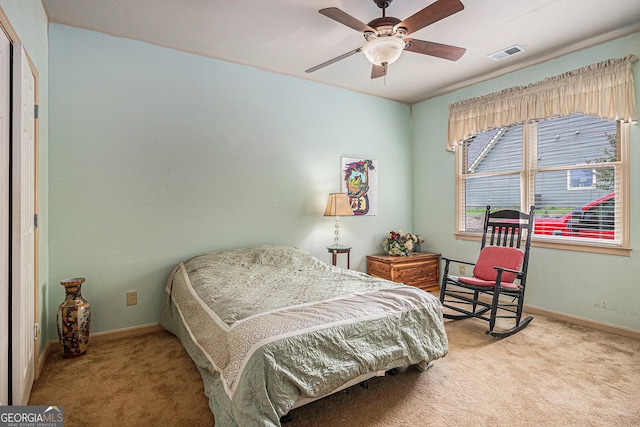 137 New Cut Rd, Winder, GA 30680 - carpeted bedroom featuring baseboards and ceiling fan