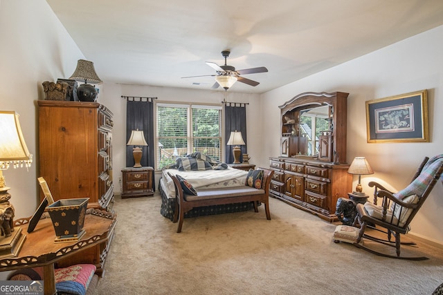 137 New Cut Rd, Winder, GA 30680 - bedroom with light colored carpet and a ceiling fan