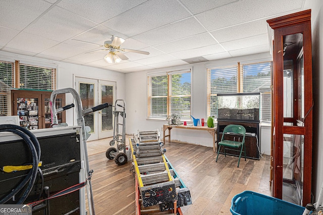 137 New Cut Rd, Winder, GA 30680 - workout room featuring a ceiling fan, wood finished floors, and a paneled ceiling
