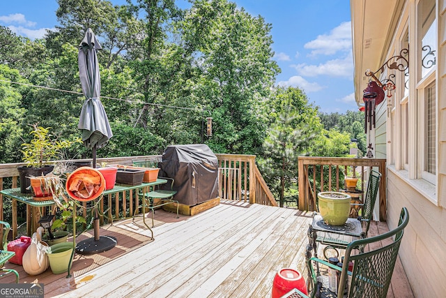 137 New Cut Rd, Winder, GA 30680 - wooden deck with a grill and view of wooded area