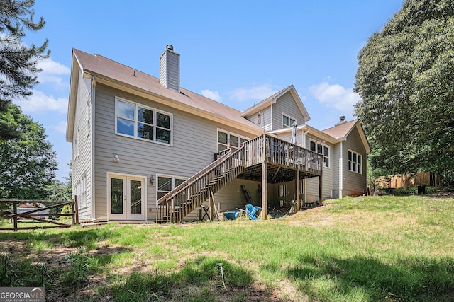 137 New Cut Rd, Winder, GA 30680 - rear view of house featuring a wooden deck, a chimney, stairway, and french doors