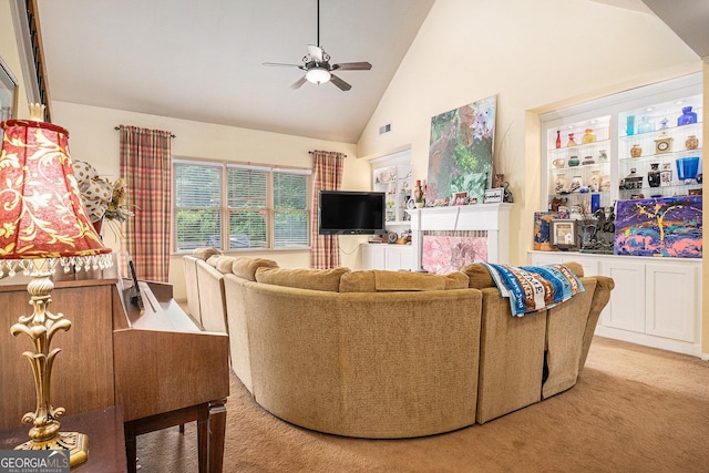 137 New Cut Rd, Winder, GA 30680 - carpeted living area with a ceiling fan and high vaulted ceiling
