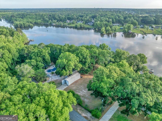 aerial view featuring a water view and a view of trees