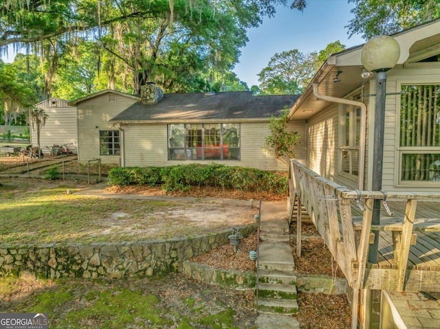 view of home's exterior featuring stairway