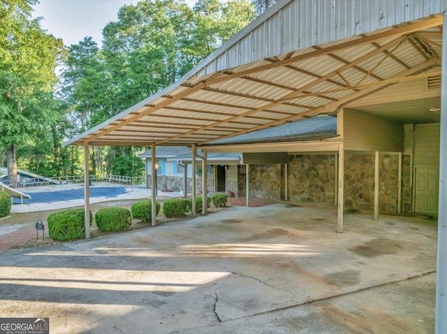 view of car parking featuring a carport